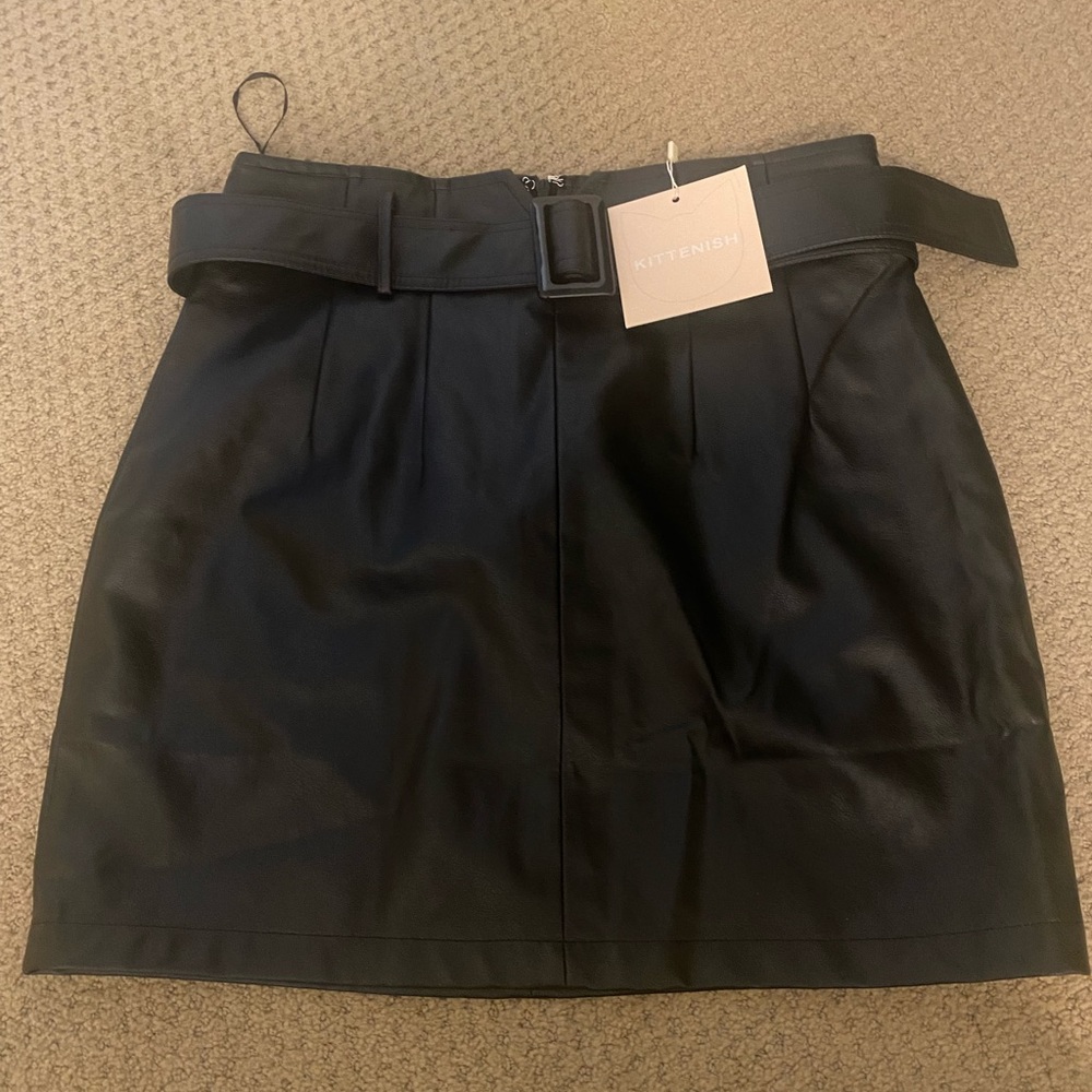 Kittenish black faux leather skirt